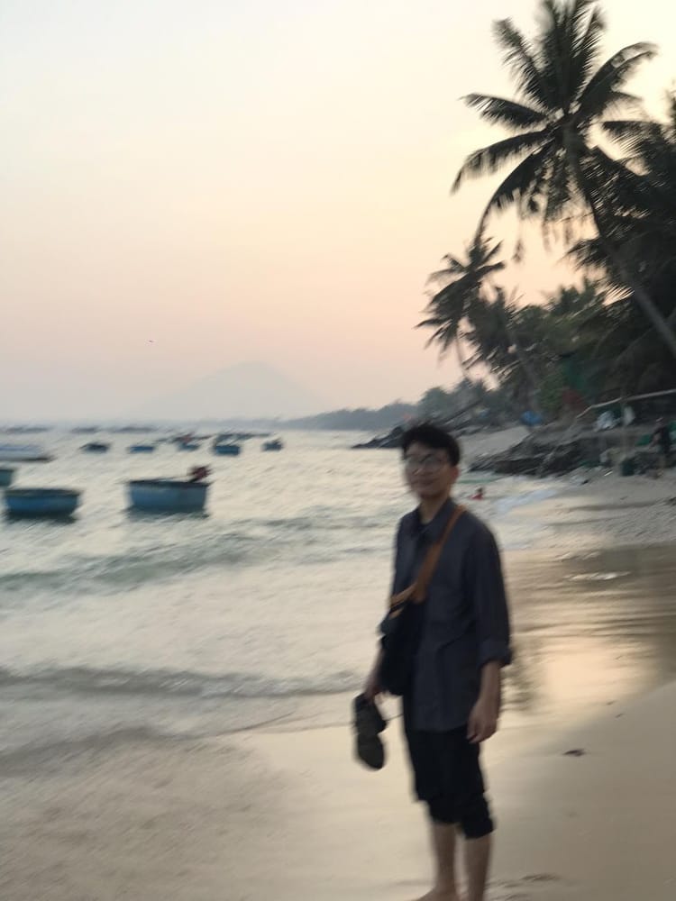 Me walking on the beach at sunset
